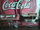 3 coke trucks 1truck metal stand
