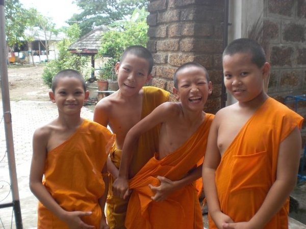 3774805-Young-monks-taken-by-Hay