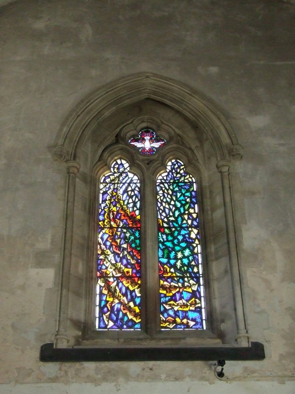 A modern stained glass window wi
